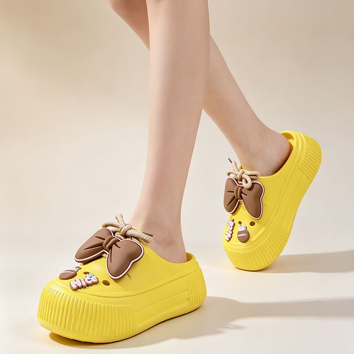 Platform bow-detail closed-toe slides