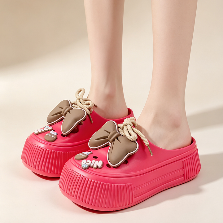 Platform bow-detail closed-toe slides