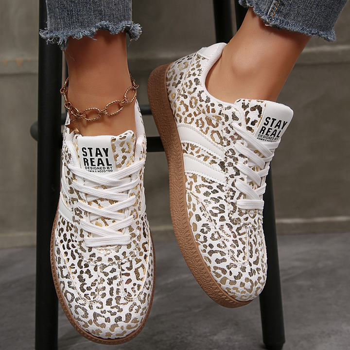 Glossy iridescent leopard-print low-top sneakers